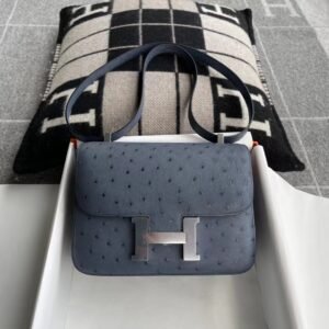 Buckle Flap Bag 24cm – Ostrich, Gris Agate / Rouge Casaque, Silver Hardware