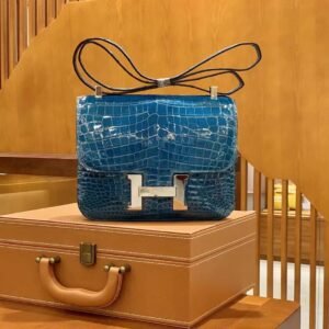 Buckle Flap Bag 24cm – Shiny Niloticus Crocodile, Izmir Blue, Silver Hardware