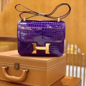 Buckle Flap Bag 24cm – Shiny Porosus Crocodile, Dreamy Purple, Gold Hardware
